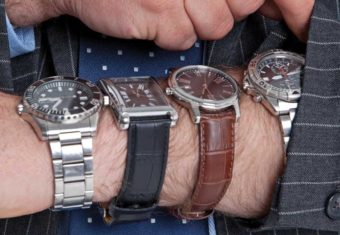 man 4 wristwatches time seconds