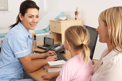 Nurse measuring patient's blood pressure