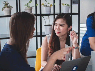 manager speaking to employee