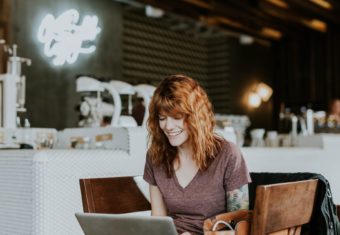 Woman using tips to improve her resume