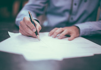 Man addressing a cover letter