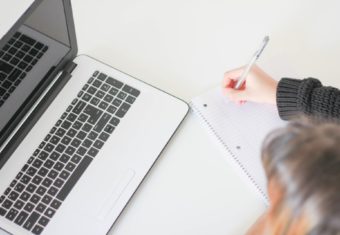 Woman Writing a Resume