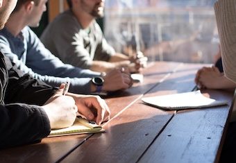 qualified professionals having at work meeting at the office