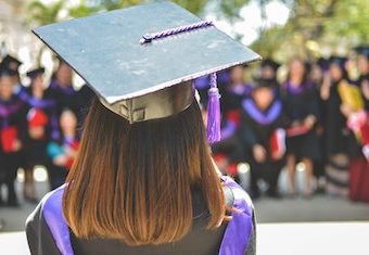 young woman graduating college