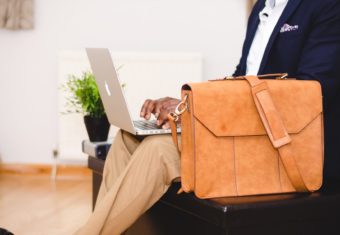Man writing a cover letter for a job