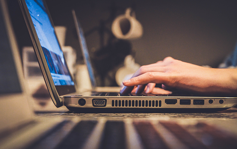 How to write a federal resume Image of a job-seeker writing their federal resume