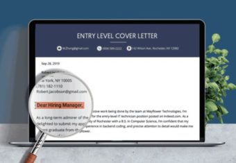 image of a cover letter opening with a magnifying glass, how to address a cover letter hero concept