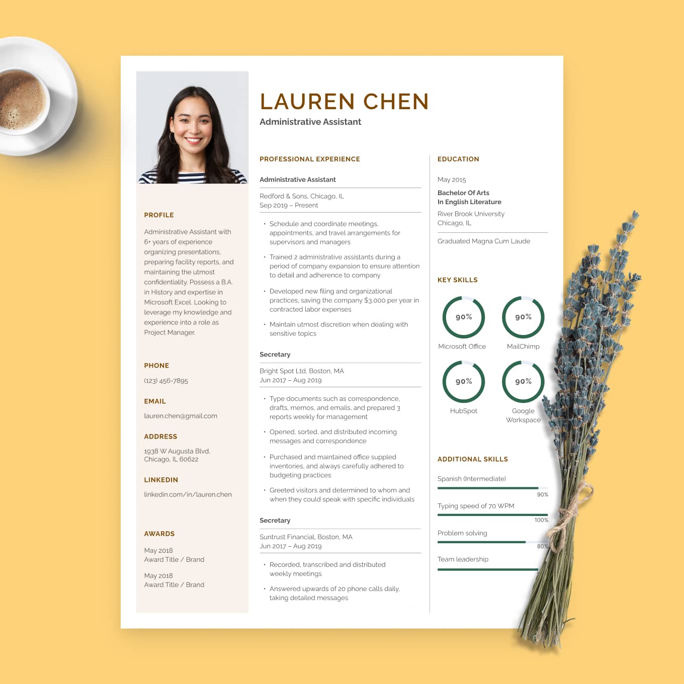 Our Millennial resume template on a wooden table with a fern frond beside it.