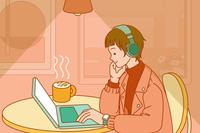 A female new collar jobs worker working at a cafe with her laptop and a cup of coffee