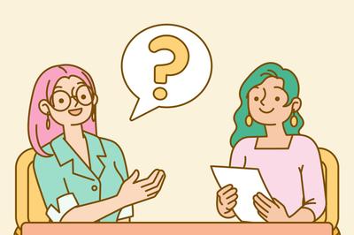 An interviewer asking a candidate a question in a job interview.